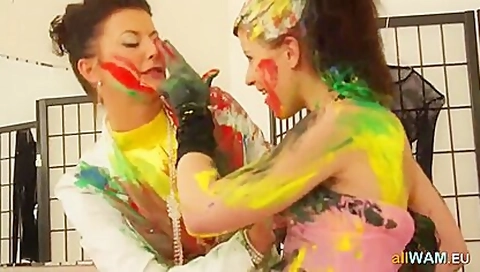 Mature Lesbian Smears Paint On A Friend